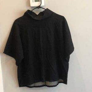 Black turtle neck sweater. Never worn